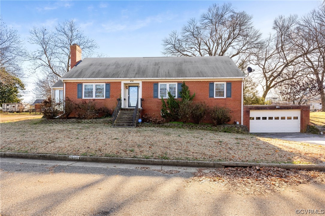406 Riverside Avenue Hopewell, VA 23860 - Photo 37 of 38 a front view of house with garden