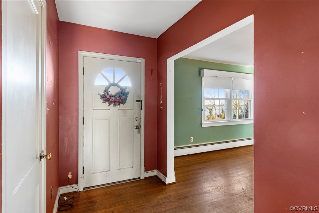 406 Riverside Avenue Hopewell, VA 23860 - Photo 5 of 38 an empty room with wooden floor closet and windows