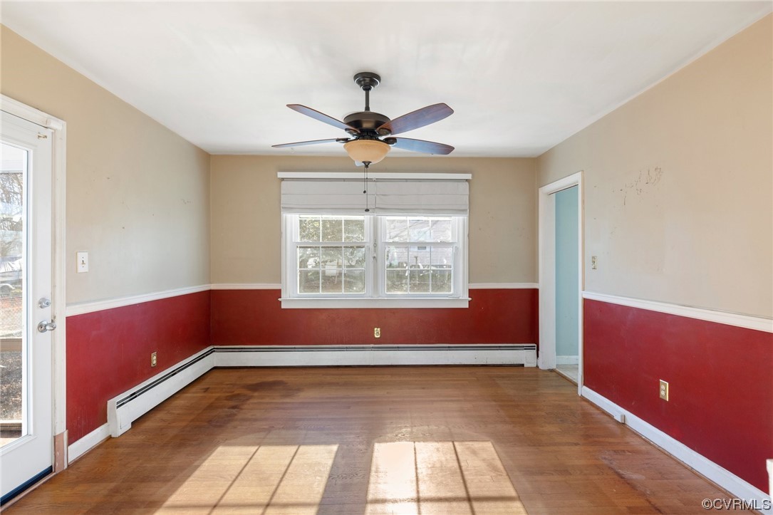 406 Riverside Avenue Hopewell, VA 23860 - Photo 10 of 38 a view of room with window and a ceiling fan