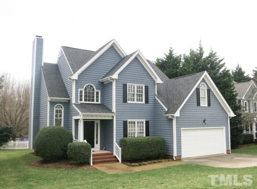 9305 Dawnshire Road Raleigh, NC 27615 - Photo 1 of 25 a view of a yard in front of a house