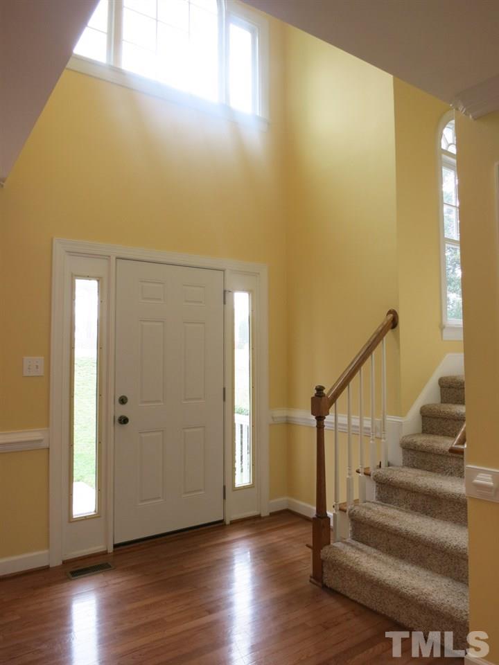 9305 Dawnshire Road Raleigh, NC 27615 - Photo 2 of 25 a view of entryway with wooden floor