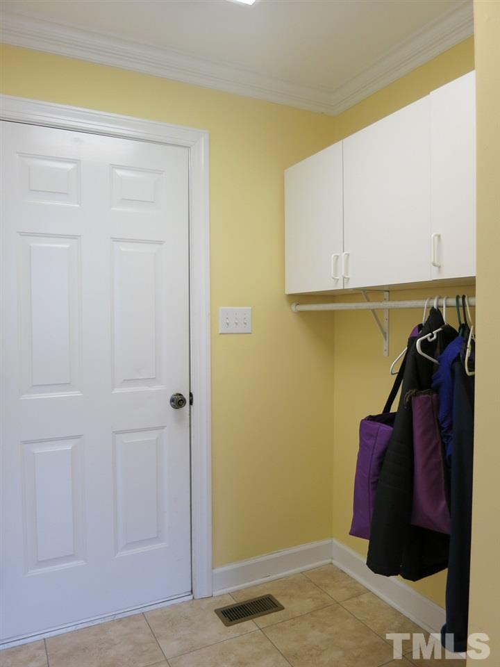 9305 Dawnshire Road Raleigh, NC 27615 - Photo 12 of 25 a view of walk in closet with clothes