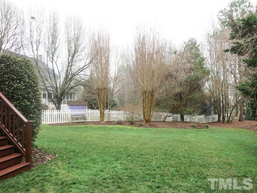 9305 Dawnshire Road Raleigh, NC 27615 - Photo 23 of 25 a view of a park with large trees