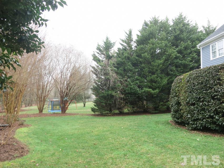 9305 Dawnshire Road Raleigh, NC 27615 - Photo 24 of 25 a view of green field