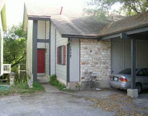 2008 Jones Road Austin, TX 78745 - Photo 1 of 1 Exterior Front : Recent exterior paint; carports in front; backs to creek!