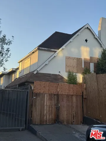 a front view of house with pathway