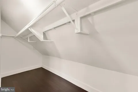 a view of an empty walk in closet