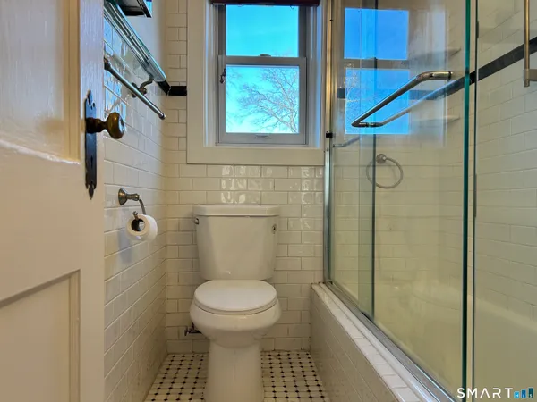 a view of a wooden door with a door