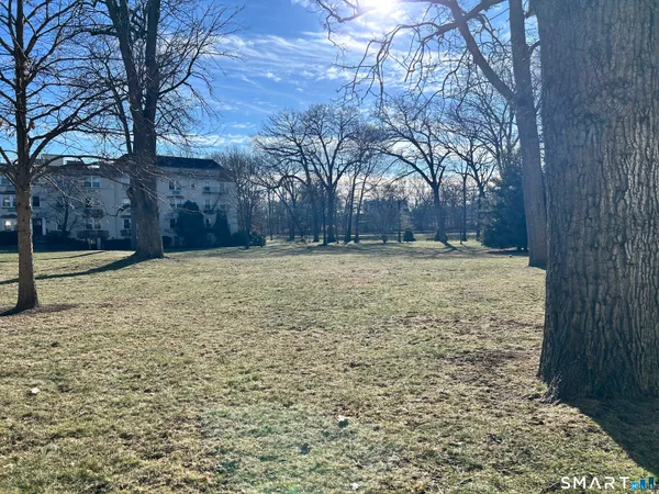 a kitchen with a refrigerator and a sink