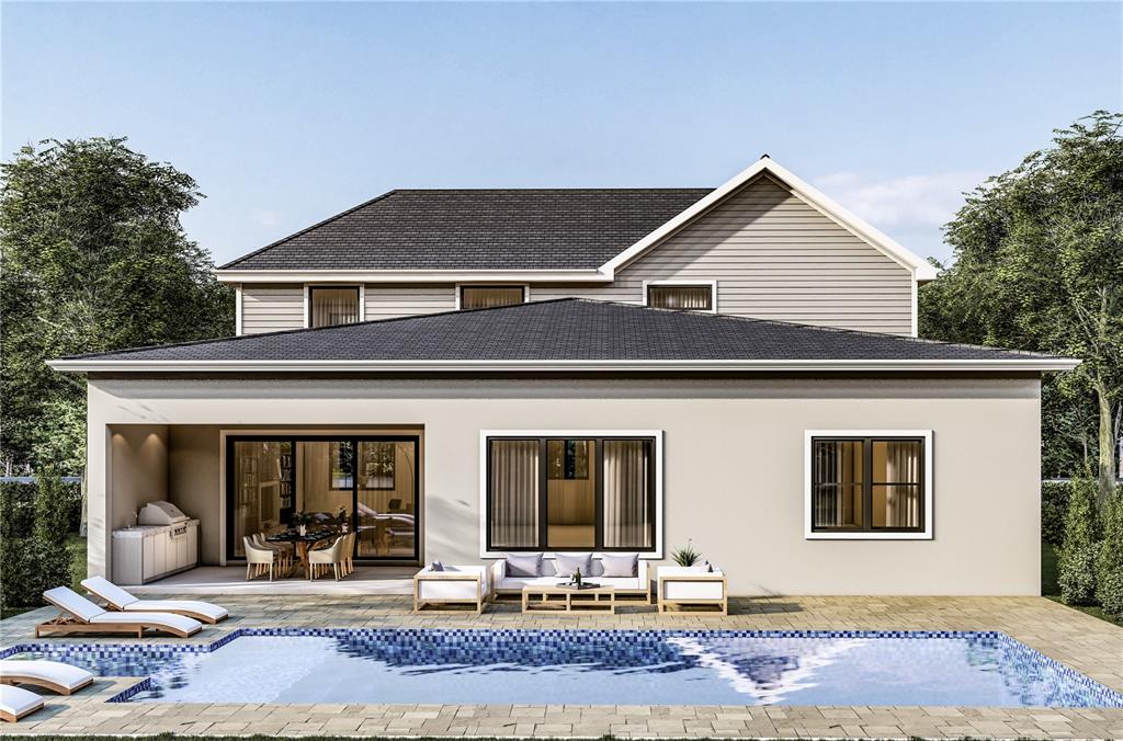 1603 Bay Road Sarasota, FL 34239 - Photo 2 of 13 a front view of a house with garden