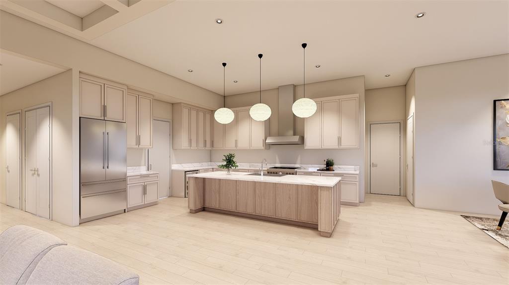 1603 Bay Road Sarasota, FL 34239 - Photo 3 of 13 a large kitchen with a large counter top space stainless steel appliances and cabinets