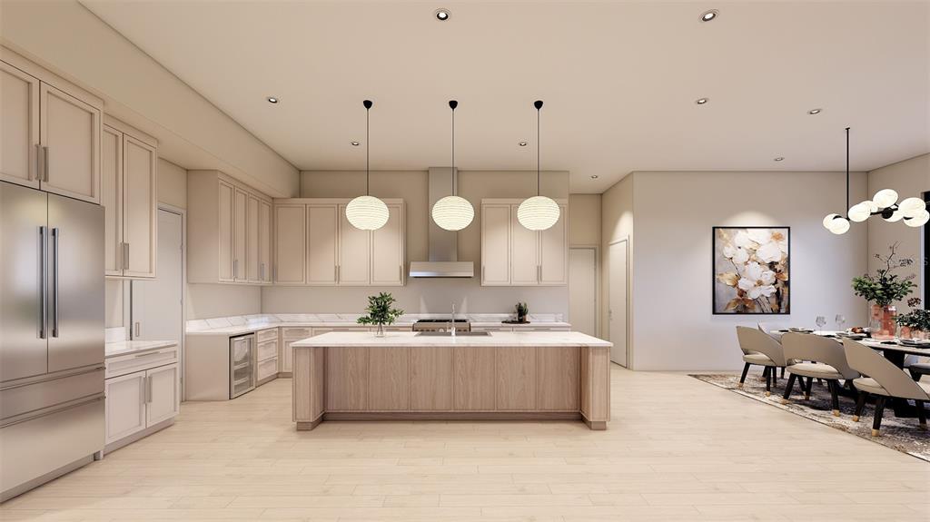 1603 Bay Road Sarasota, FL 34239 - Photo 4 of 13 a large white kitchen with a large counter space