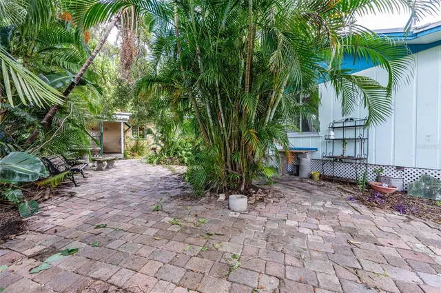 a backyard of a house with seating space