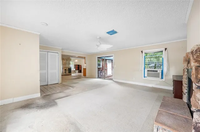 a view of a livingroom with a furniture and a window