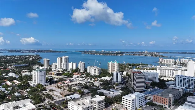an aerial view of a city with lots of residential buildings