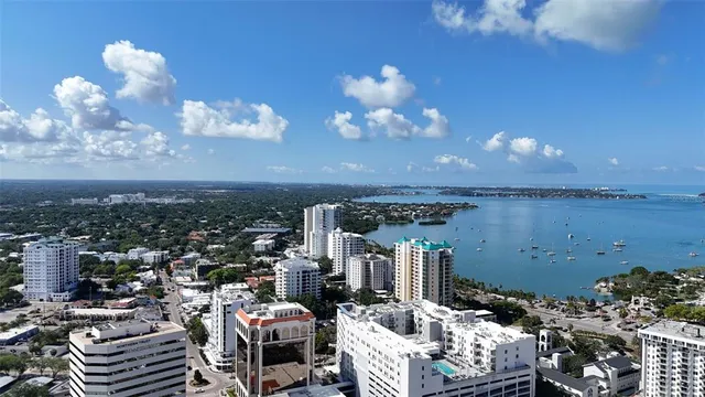a view of a lake with a city