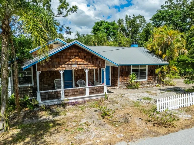 a view of a lake with a yard