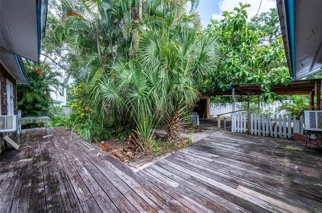 a view of a wooden floor and a yard