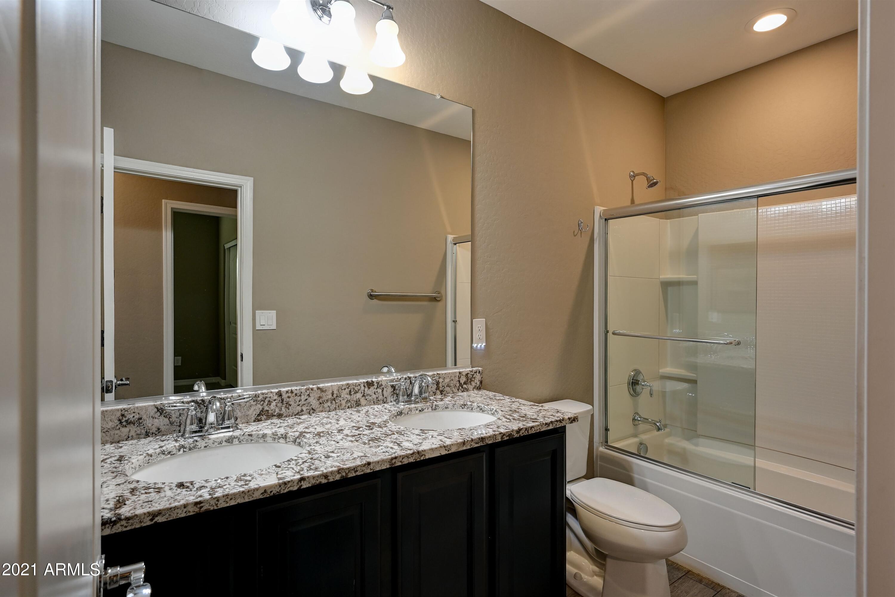 2624 West Rabjohn Road Phoenix, AZ 85085 - Photo 14 of 29 feureisen-hall bathroom