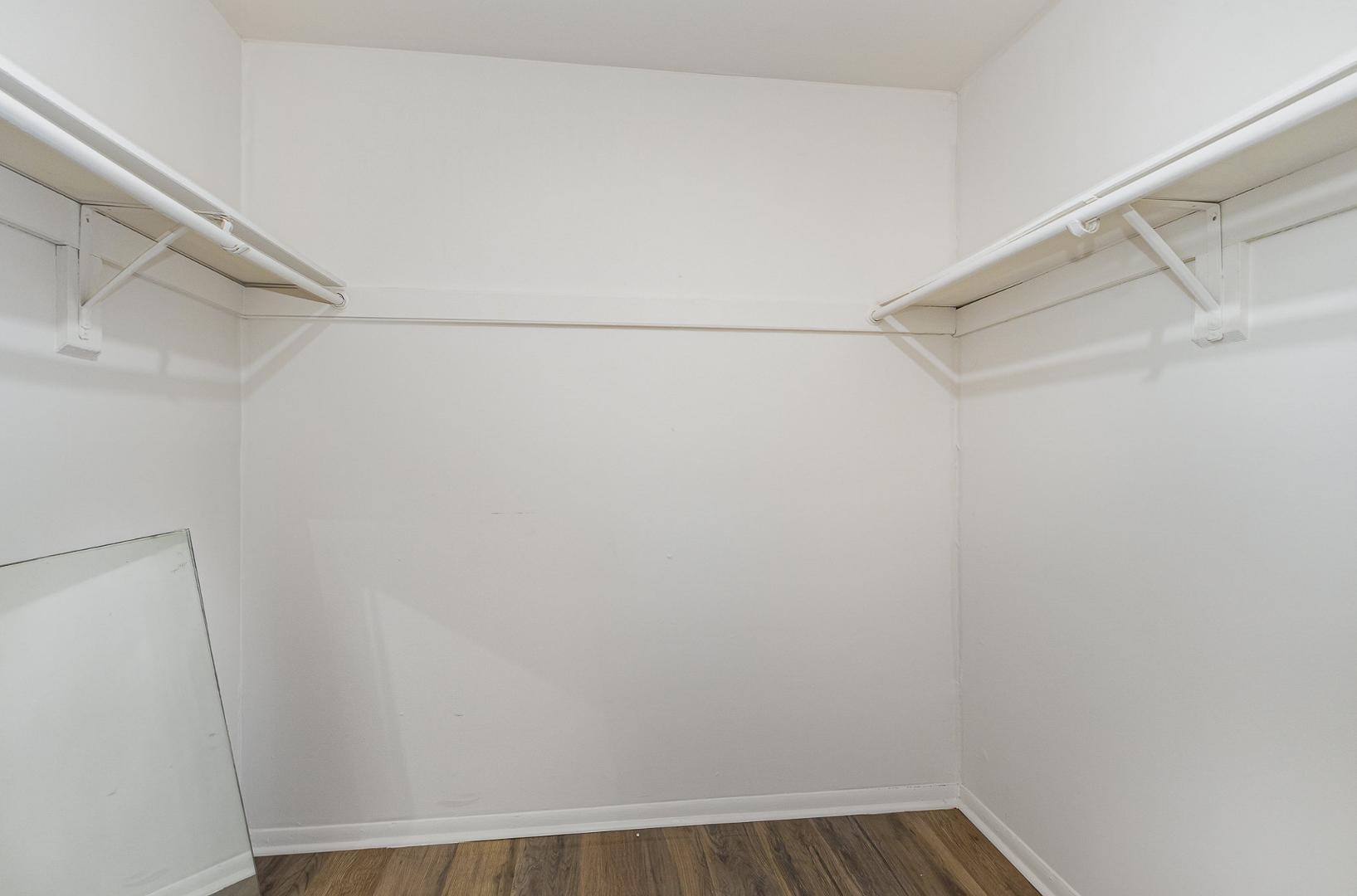 1130 Schaub Drive, Unit C Raleigh, NC 27606 - Photo 19 of 25 a view of small space with racks on the wall
