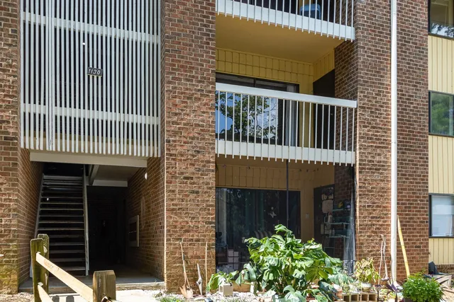 a view of a playground with basketball court
