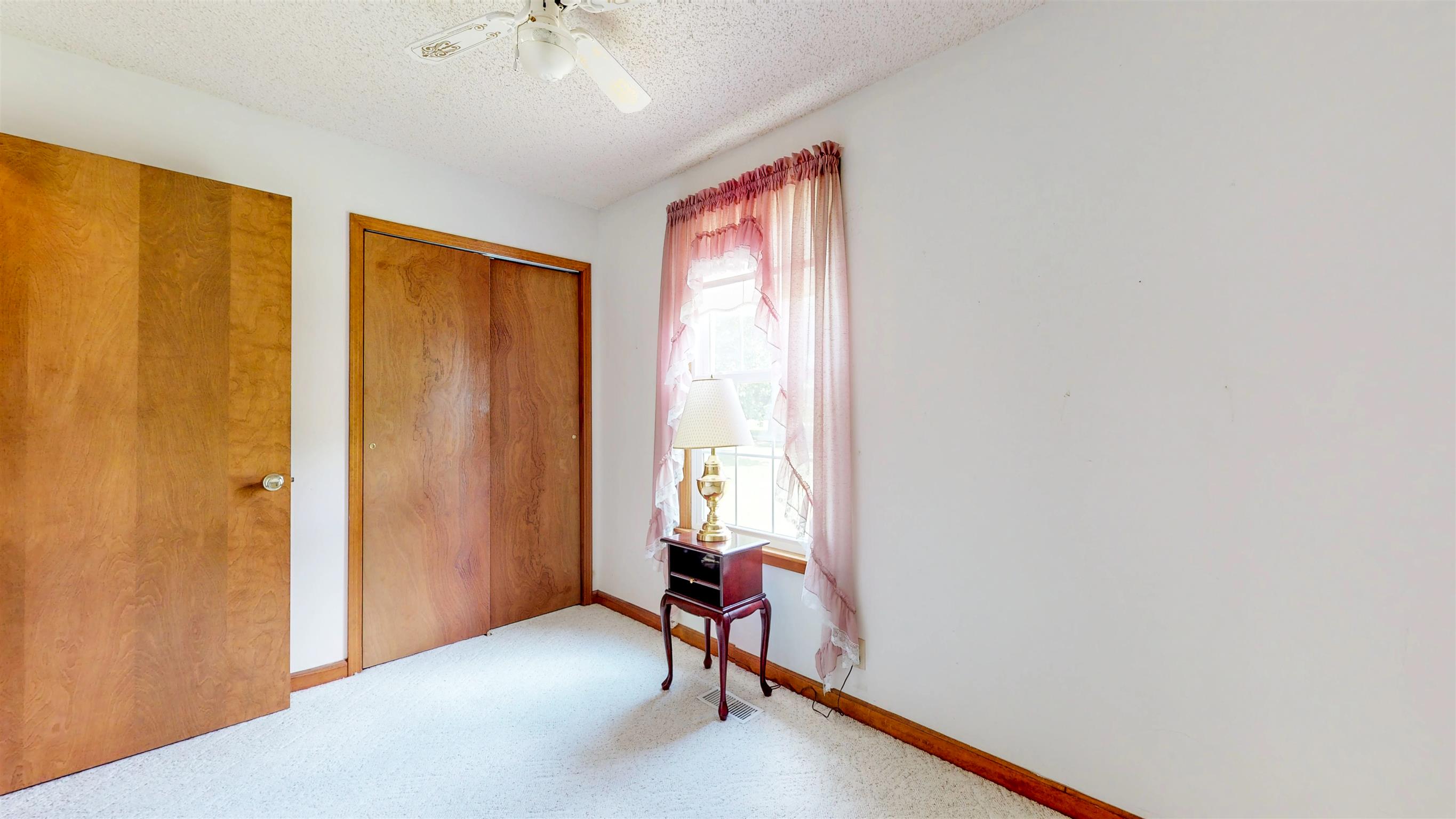 3042 New Hall Road Greenbrier, TN 37073 - Photo 12 of 28 a view of a room with a window and a ceiling fan