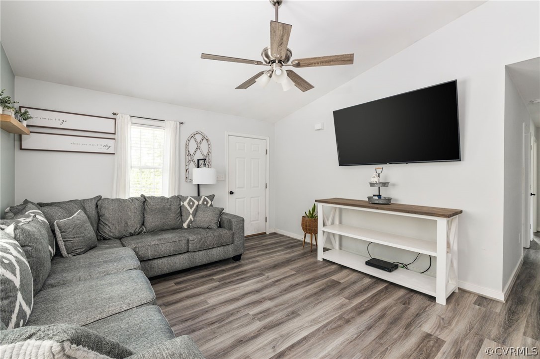 7279 Railroad Bed Road Carson, VA 23830 - Photo 8 of 36 a living room with furniture and a flat screen tv