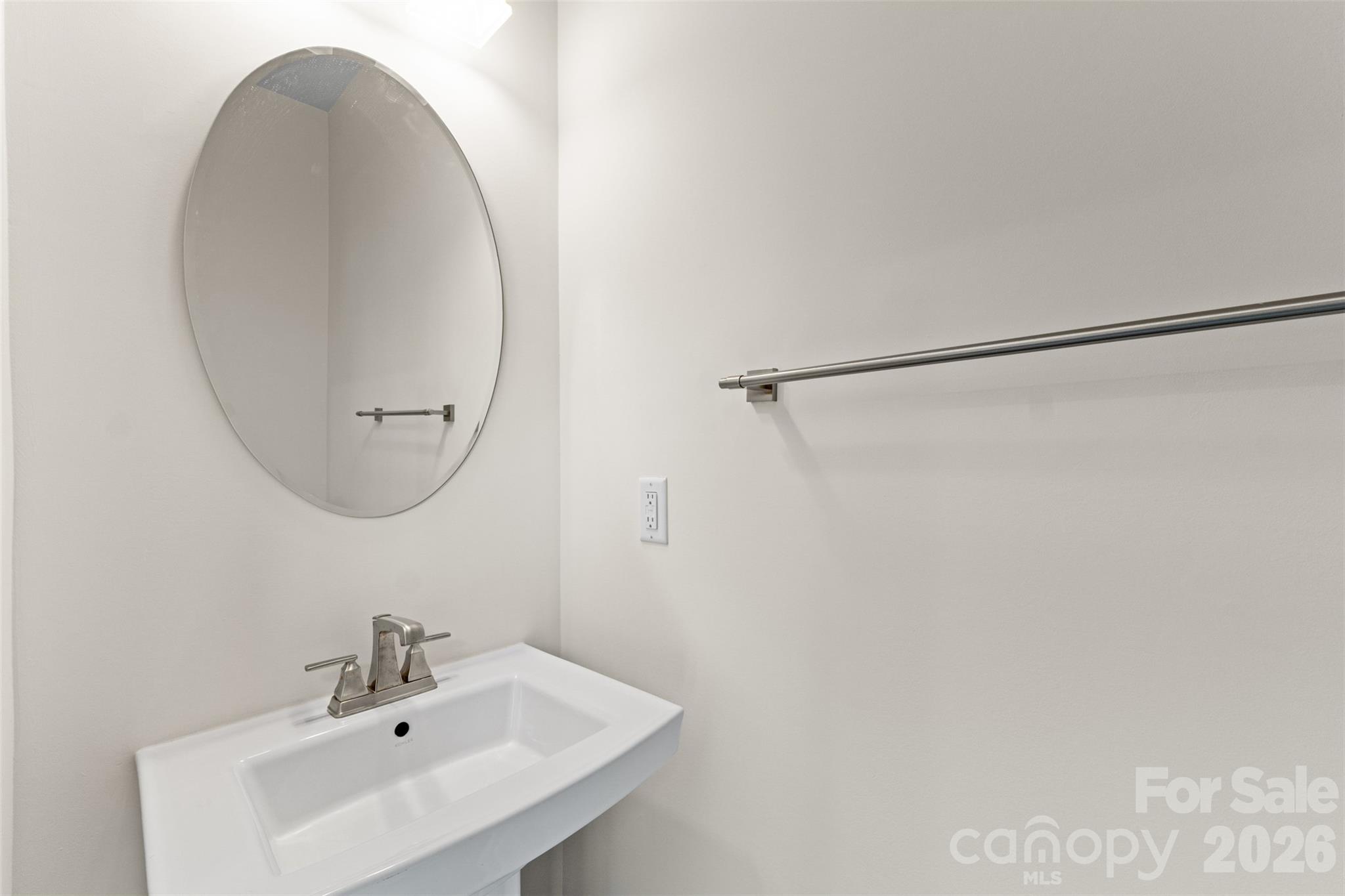 3645 South Tryon Street Charlotte, NC 28217 - Photo 11 of 45 a bathroom with a sink and a mirror