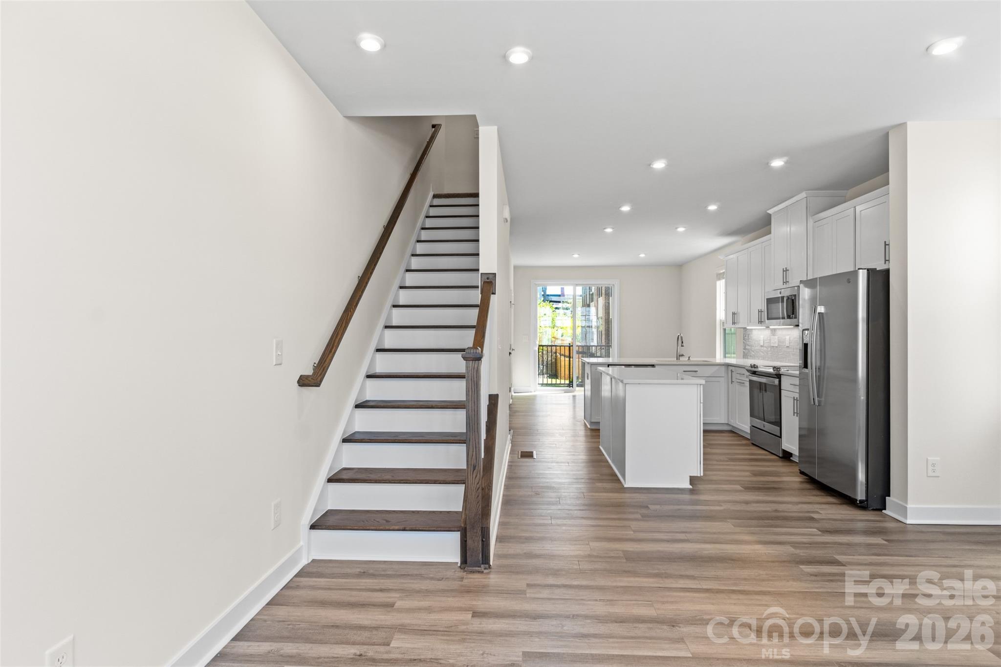 3645 South Tryon Street Charlotte, NC 28217 - Photo 15 of 45 a view of kitchen with furniture and wooden floor