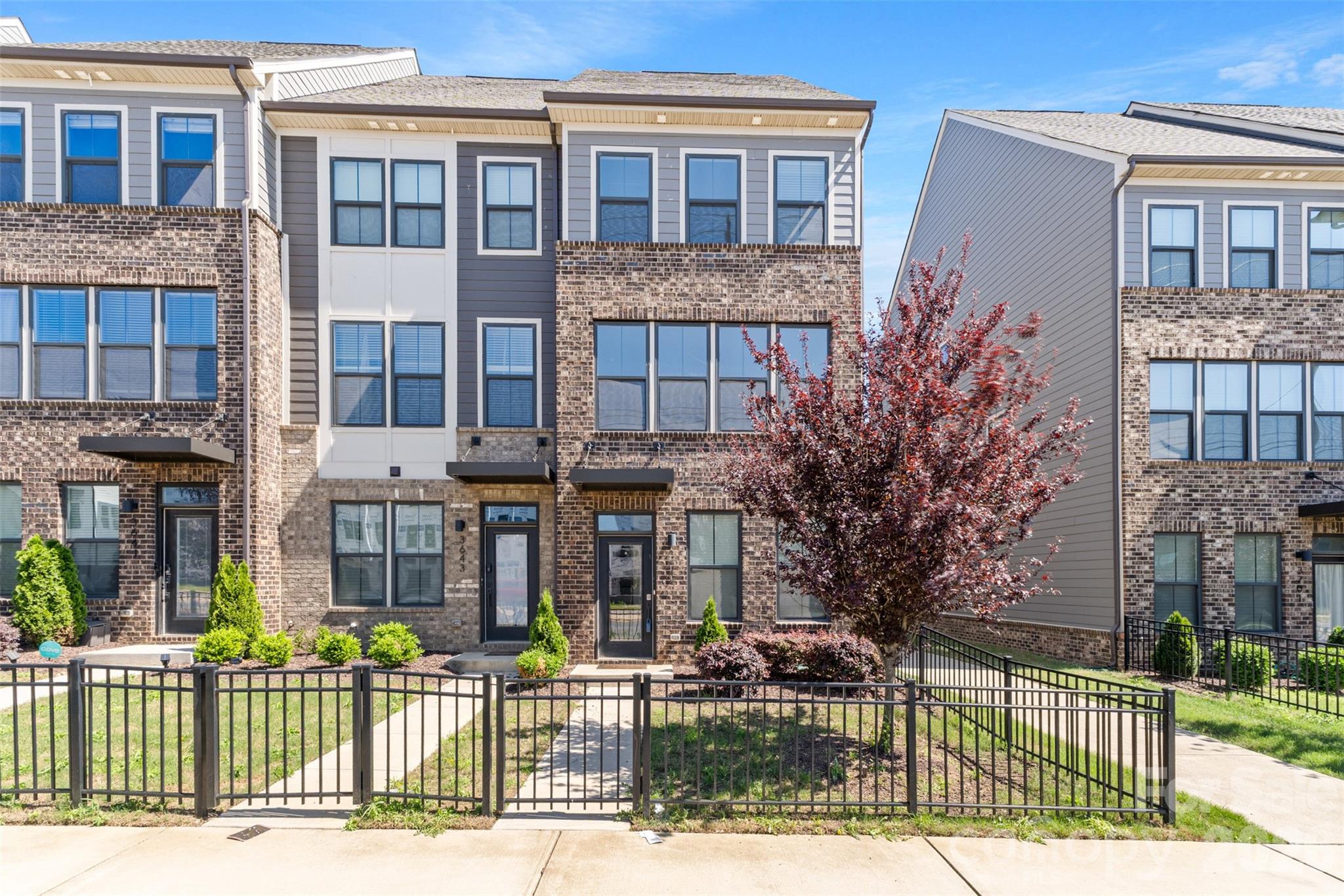 3645 South Tryon Street Charlotte, NC 28217 - Photo 2 of 45 front view of a brick building