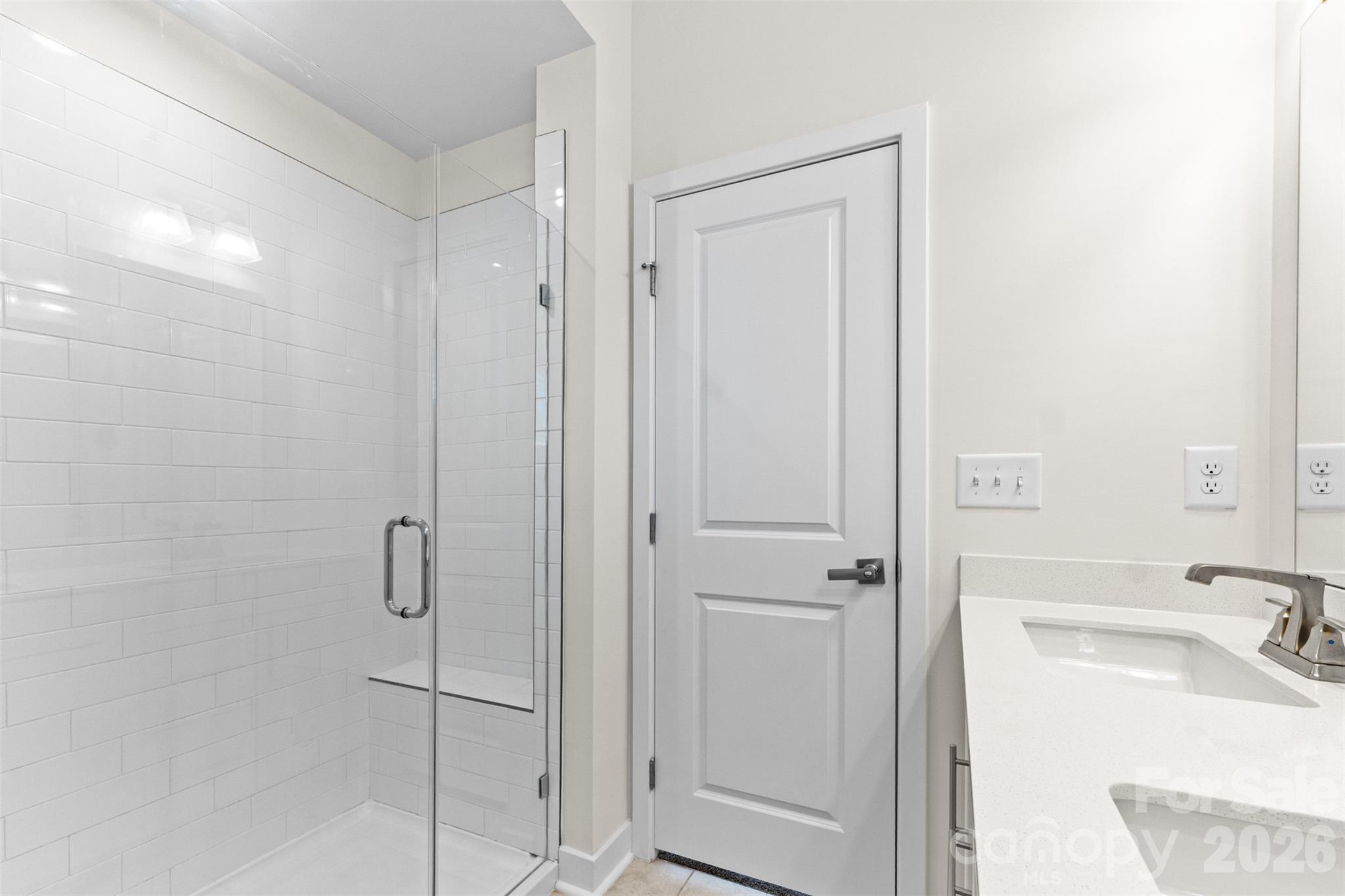 3645 South Tryon Street Charlotte, NC 28217 - Photo 22 of 45 a bathroom with a sink and vanity