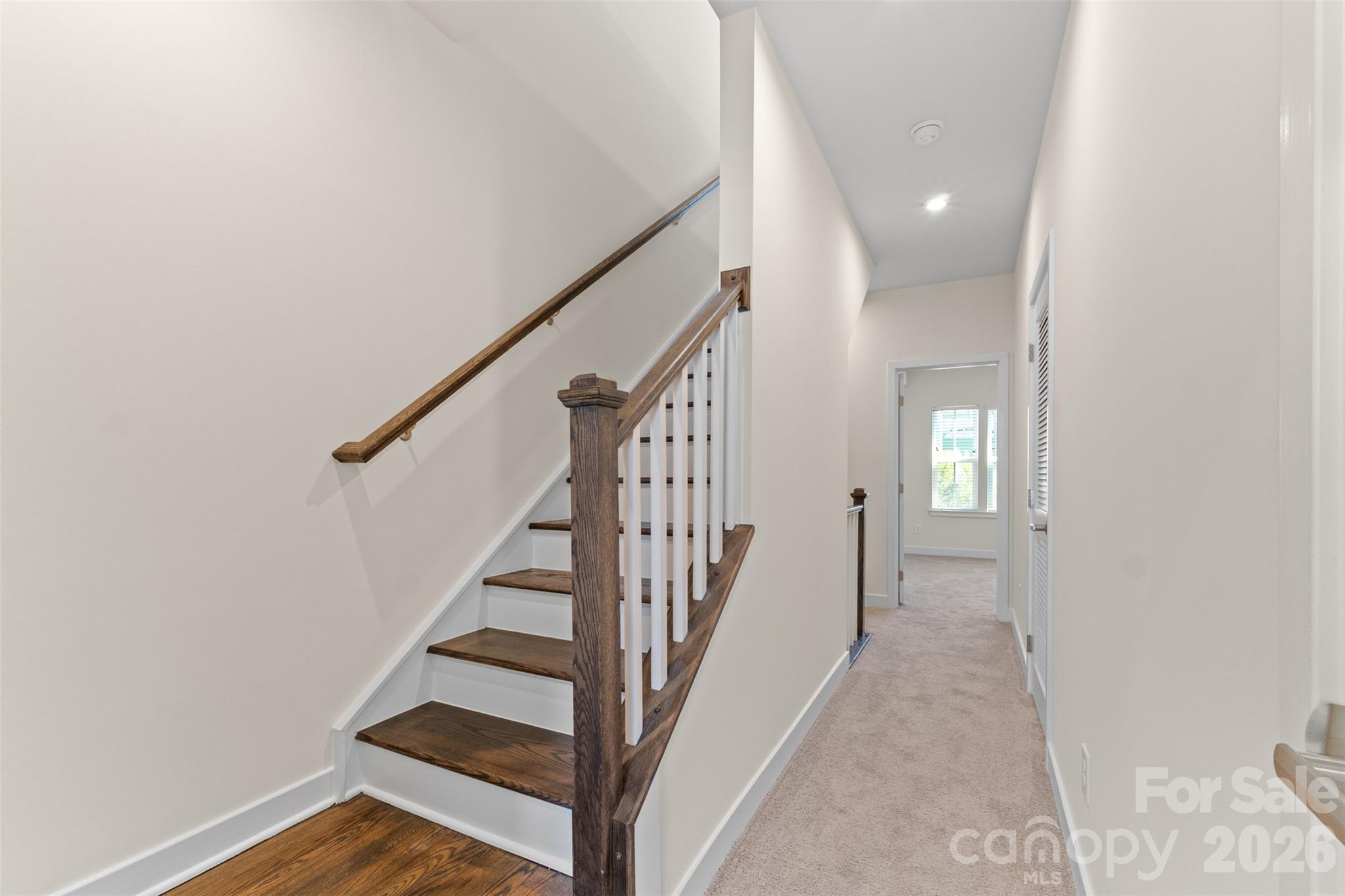 3645 South Tryon Street Charlotte, NC 28217 - Photo 23 of 45 a view of a hallway with wooden floor and entryway