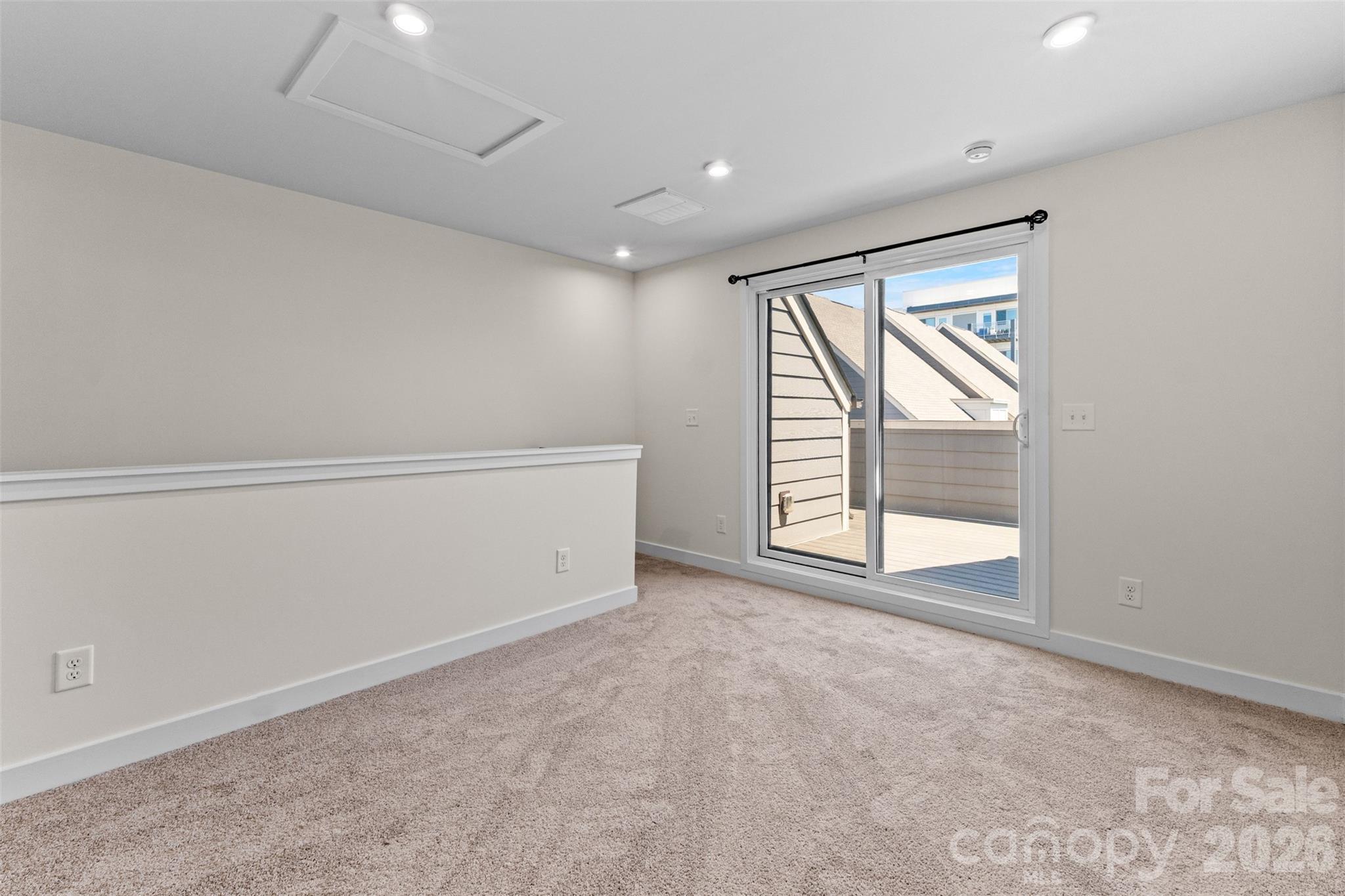 3645 South Tryon Street Charlotte, NC 28217 - Photo 28 of 45 an empty room with windows