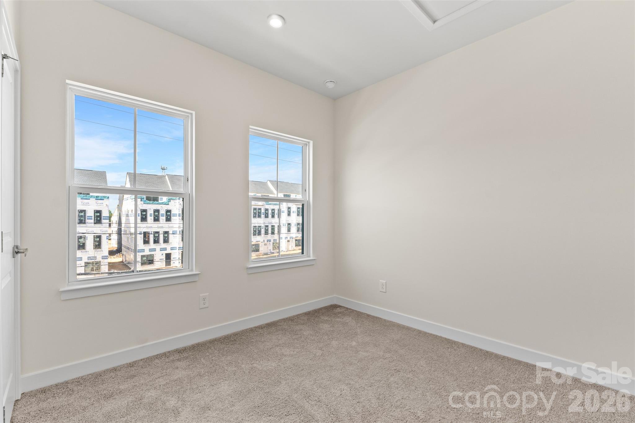 3645 South Tryon Street Charlotte, NC 28217 - Photo 33 of 45 a view of an empty room with a window
