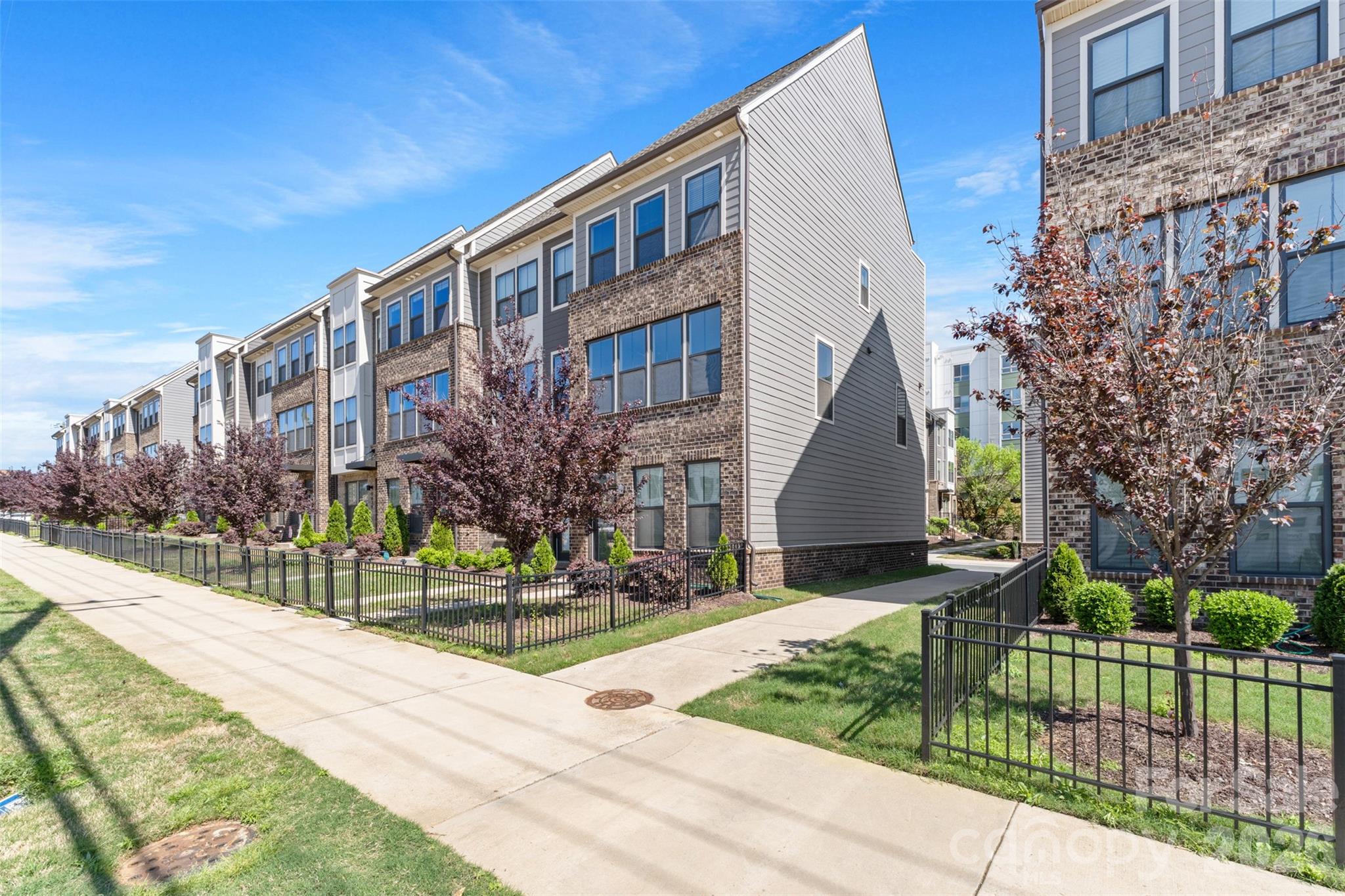 3645 South Tryon Street Charlotte, NC 28217 - Photo 4 of 45 a view of building with yard and green space