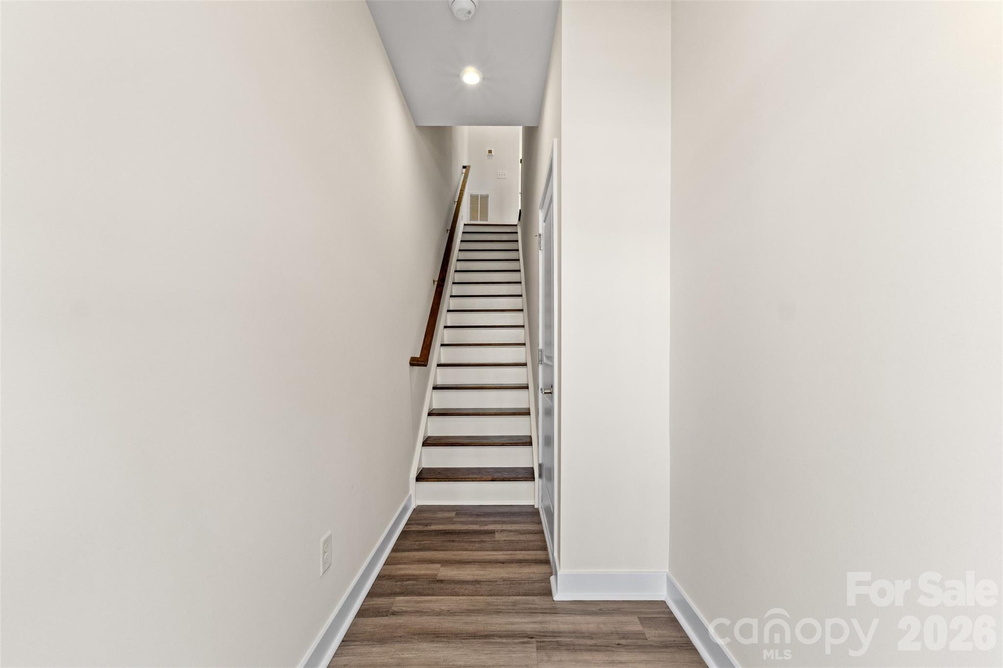 3645 South Tryon Street Charlotte, NC 28217 - Photo 5 of 45 a view of a hallway with stairs