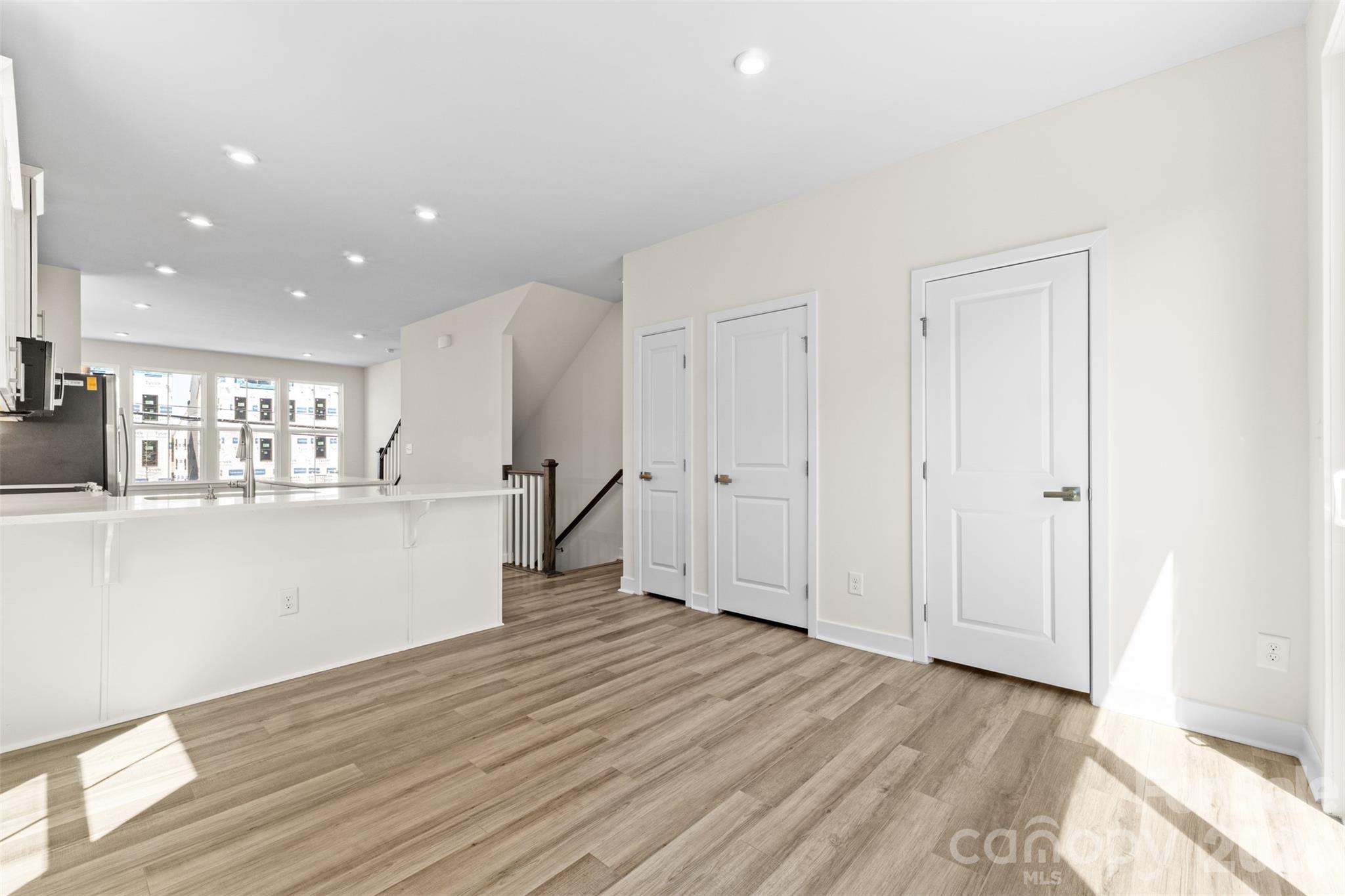 3645 South Tryon Street Charlotte, NC 28217 - Photo 8 of 45 a view of a kitchen with wooden floor