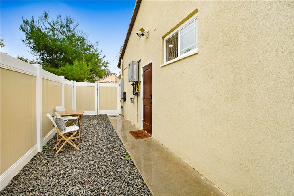 9732 Belmont Drive Riverside, CA 92503 - Photo 12 of 20 a backyard of a house with table and chairs