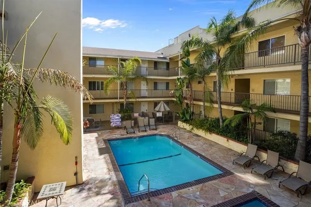 a view of a chairs and table in the patio