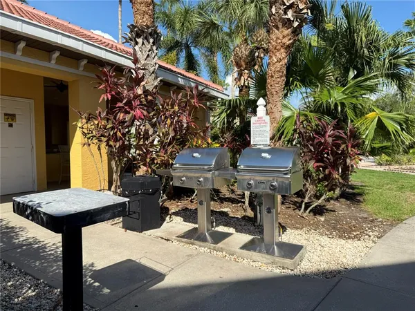 a view of a bench in front of a house
