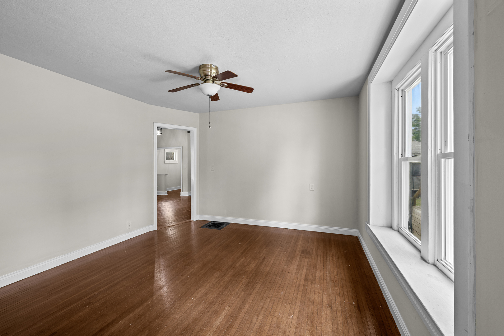 1202 20th Avenue Viola, IL 61486 - Photo 29 of 50 wooden floor in an empty room with a window