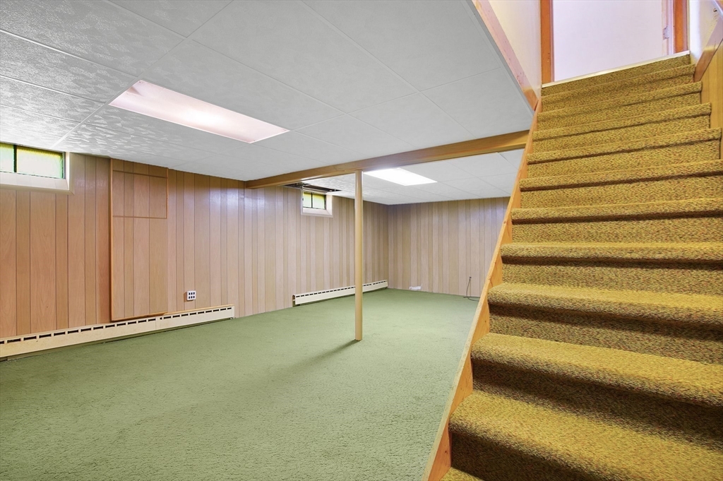 100 Mathieu Drive Chicopee, MA 01020 - Photo 24 of 37 a view of an empty room with stairs