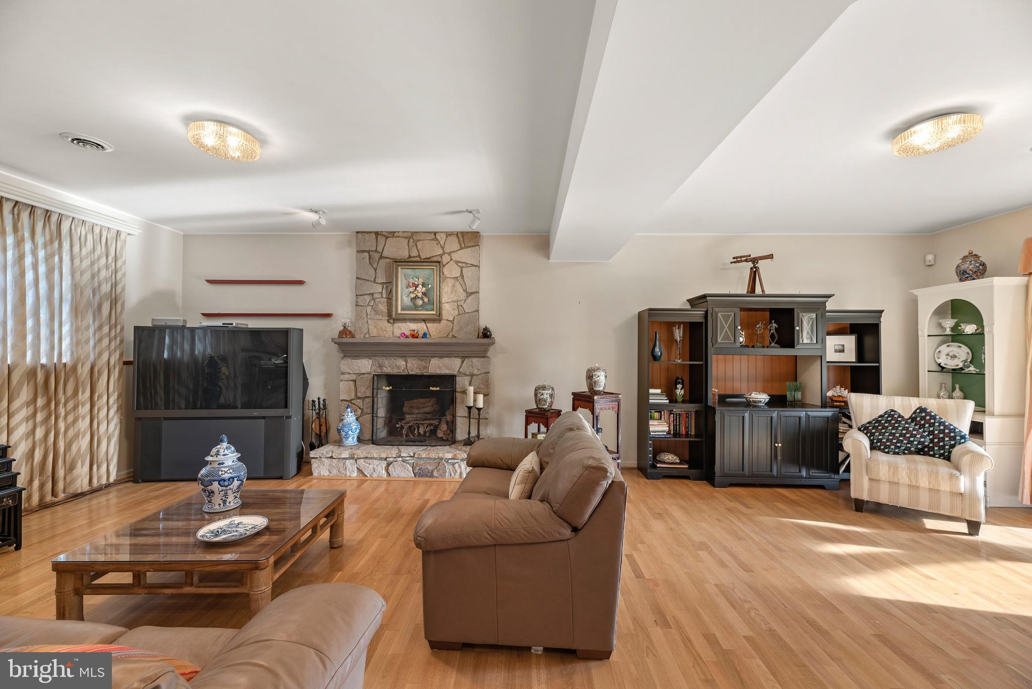 4930 Damascus Road Gaithersburg, MD 20882 - Photo 29 of 52 Family Room w/Fireplace w/Sliders to Patio