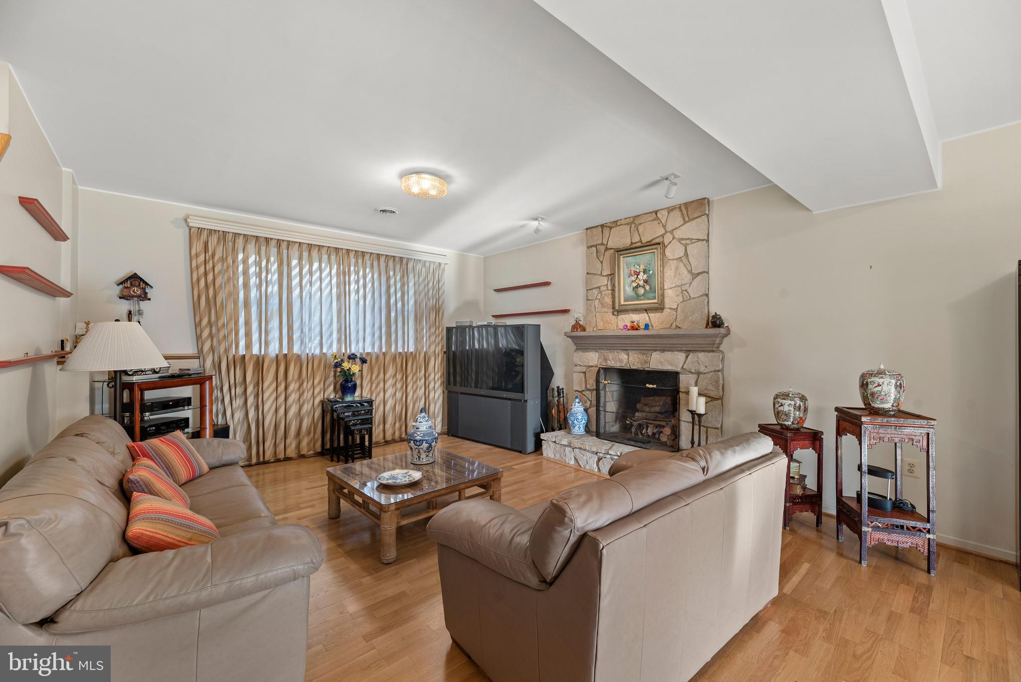 4930 Damascus Road Gaithersburg, MD 20882 - Photo 30 of 52 Family Room w/Fireplace & Picture Window