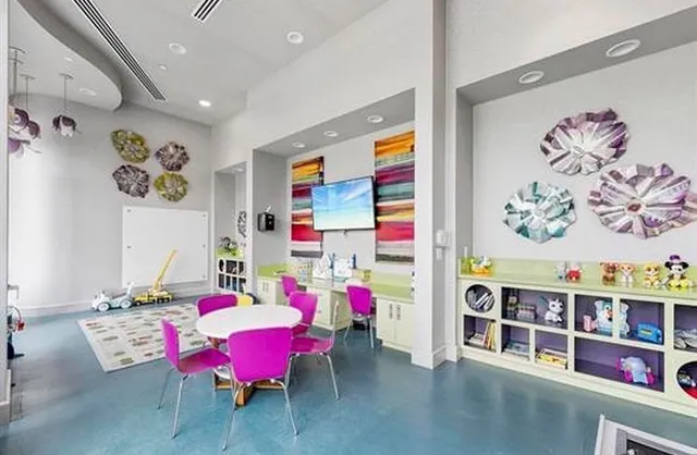 a bathroom with a sink double vanity and a mirror