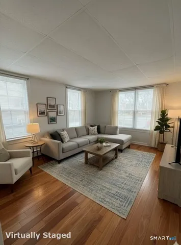 a living room with furniture and a couch