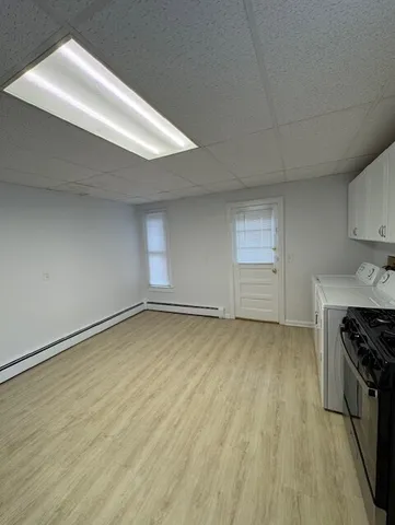 a view of a kitchen with a sink and a stove