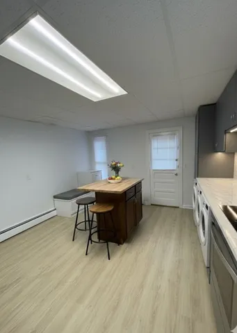 a workspace with furniture and window