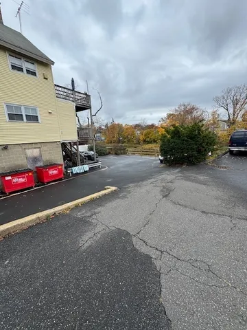a view of a street with cars