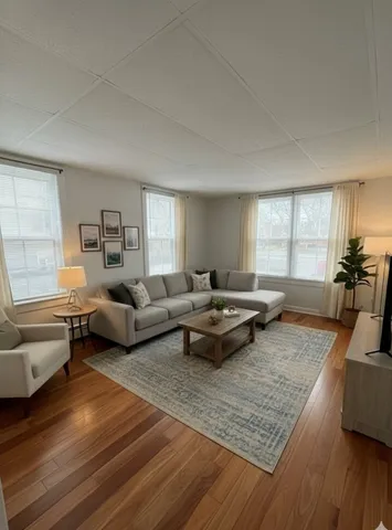 a living room with furniture and a couch